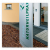 Praxisschild als freistehender Pylon vor dem Haus