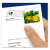 Hand hält Briefumschlag mit Beispielgestaltung einer Briefmarke mit Infopostwelle der Deutschen Post